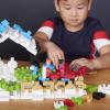 imageGuidecraft IO Blocks Tabletop System  118 Pieces Gears Axles IO People ampamp Cows Kids Interlocking Learning Toys