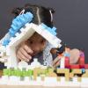 imageGuidecraft IO Blocks Tabletop System  118 Pieces Gears Axles IO People ampamp Cows Kids Interlocking Learning Toys