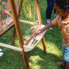 imageGuidecraft Acadia IndoorOutdoor Art Easel for Kids Acacia Wood DoubleSided Foldable SeeThru Easel  Easy to Clean Art Station w 5 Paint Cups Paper Clips Clear DryErase Board Marker Tray