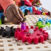 image:imageGuidecraft IO Blocks STEM Table with Gears 109 IO Blocks Pieces IO People Gears Slides and Axels Storage Bins with Activity Table for Kids  STEM Educational and Learning Toy for Children